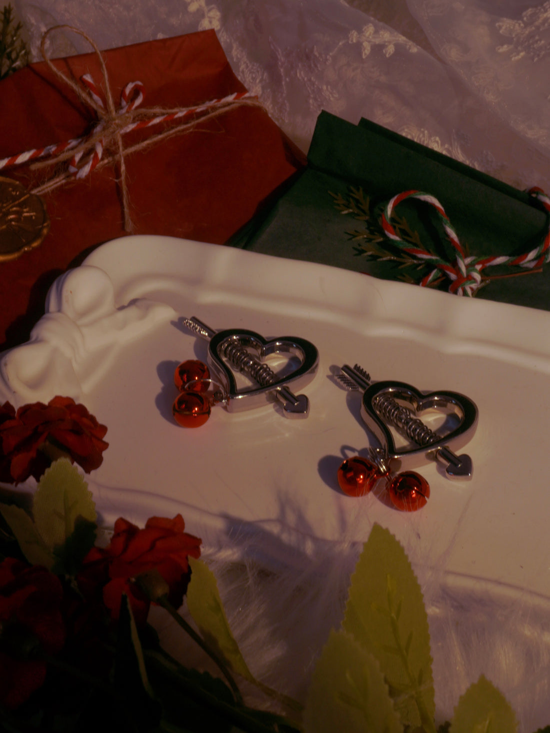 Reveriee Cupid’s Blade Nipple Clamps | Stainless Steel Clamps with Red Jingle Bells